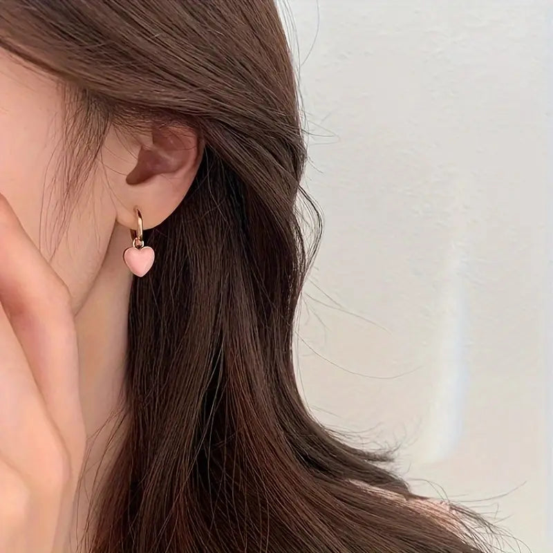 Lämpimän kiillon korvakorut | Yhdessä rintasyöpää vastaan