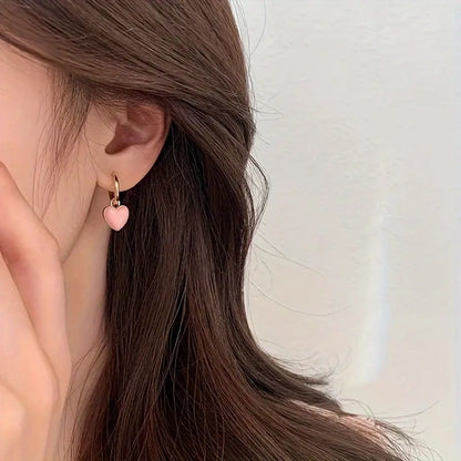 Lämpimän kiillon korvakorut | Yhdessä rintasyöpää vastaan